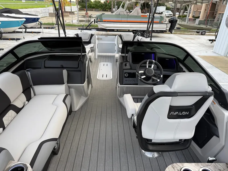 Slide: The Image of Avalon Excalibur - 27 FT Elite Windshield w/ Twin 400HP Mercury V10's and JOYSTICK CONTROLS!! 2025 - 7