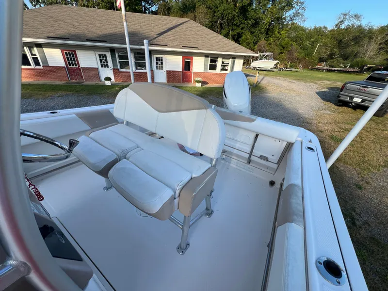 Slide: The Image of The image shows the cockpit of a 2020 Robalo R242 Center Console boat. - 26