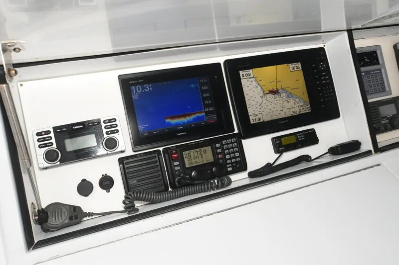 Slide: The Image of Hatteras 50 Convertible 2001 navigation equipment dashboard. - 27