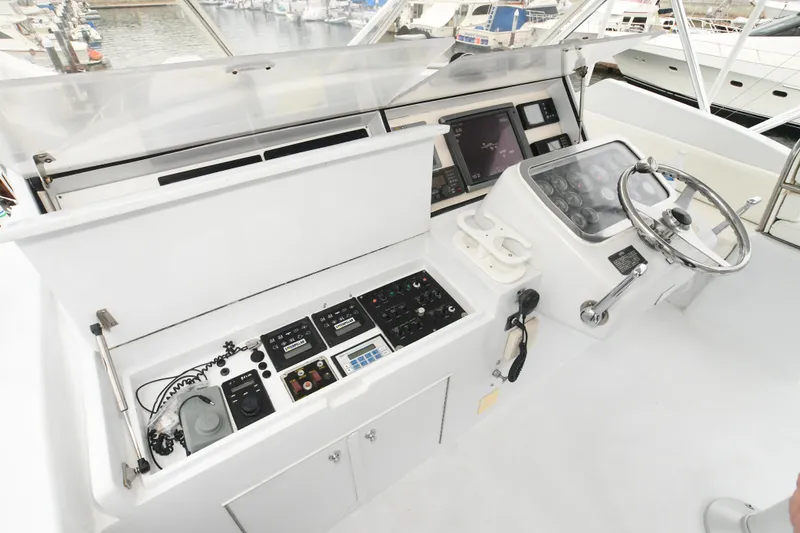 Slide: The Image of Helm station of 2001 Hatteras 50 Convertible yacht. - 29