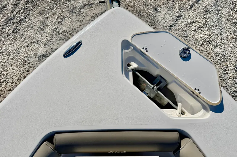 Slide: The Image of Bow of 2023 Key West 239 DFS boat with anchor compartment open. - 11