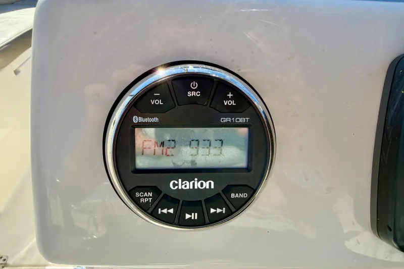 Slide: The Image of Clarion GR10BT radio on 2023 Key West 239 DFS boat dashboard. - 19