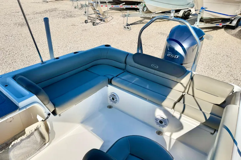 Slide: The Image of 2023 Key West 239 DFS boat interior with seating and Yamaha 250 engine. - 28