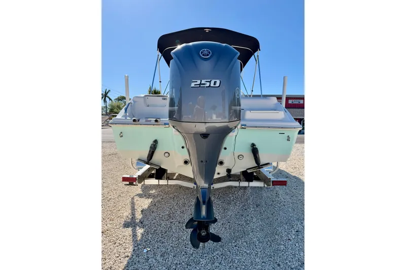 Slide: The Image of 2023 Key West 239 DFS boat with powerful 250 horsepower engine, rear view. - 35