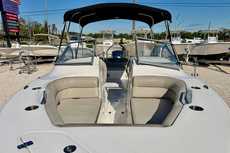 Slide: The Image of 2023 Key West 239 DFS boat with spacious seating and sleek design. - 8