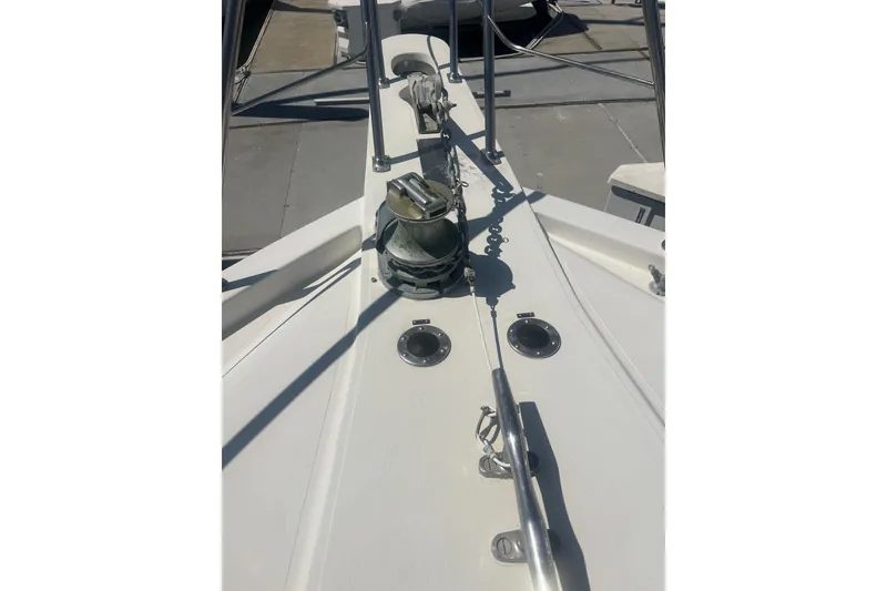 Slide: The Image of Bow view of 1990 Californian 52 Cockpit Motor Yacht at dock. - 19