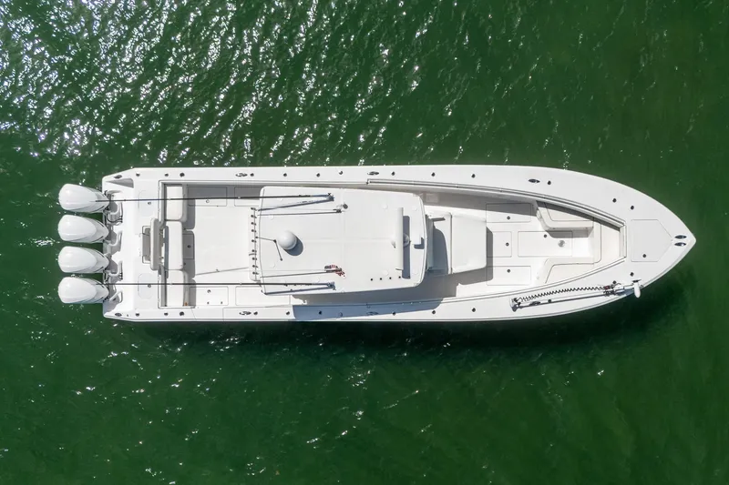Slide: The Image of Overhead view of 2016 SeaHunter 45 boat on green water. - 5