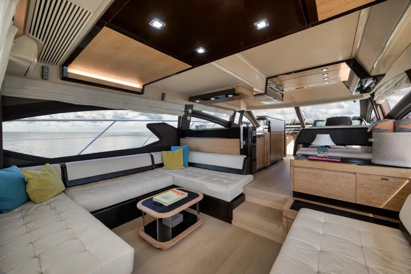 Slide: The Image of Luxurious interior of a 2012 Azimut 64 yacht with modern furnishings and panoramic windows. - 17