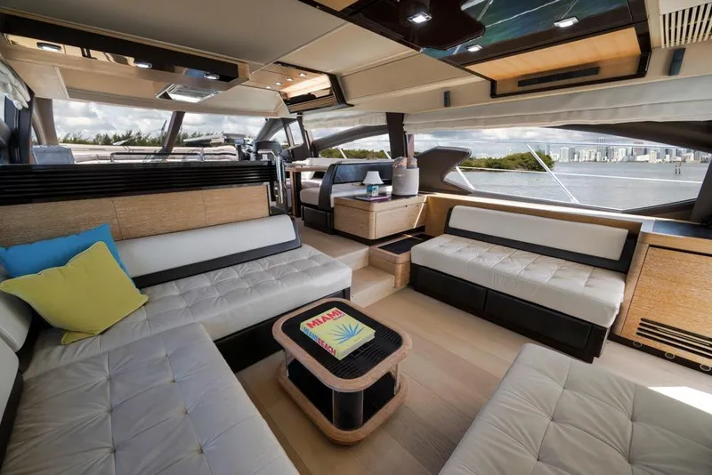 Slide: The Image of Luxurious interior of 2012 Azimut 64 yacht with modern seating and scenic views. - 19