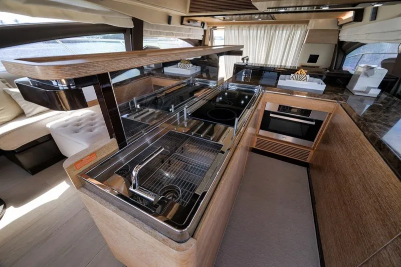 Slide: The Image of Luxurious kitchen interior of a 2012 Azimut 64 yacht with modern appliances. - 27