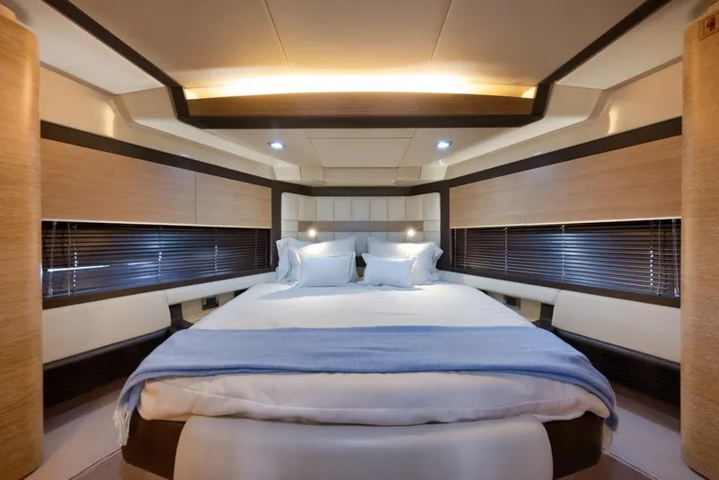 Slide: The Image of Luxurious bedroom interior of 2012 Azimut 64 yacht with modern design and cozy bedding. - 29