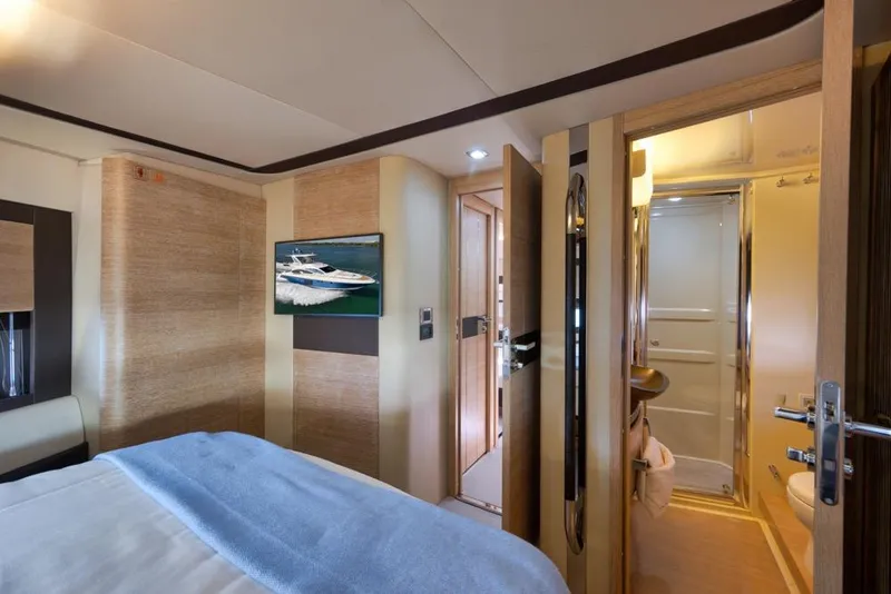Slide: The Image of Luxurious interior of 2012 Azimut 64 yacht with modern bedroom and ensuite bathroom. - 30
