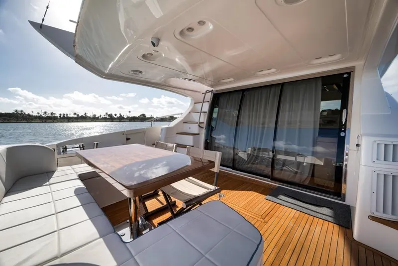 Slide: The Image of Luxurious 2012 Azimut 64 yacht deck with seating and ocean view. - 40
