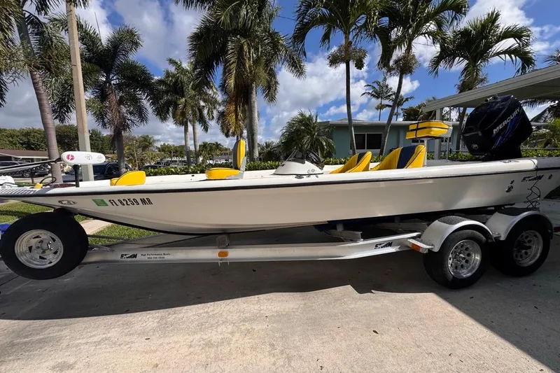 The Image of 2005 Storm Boats Storm-High Performance on trailer, parked under palm trees. - 0