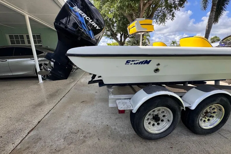 Slide: The Image of 2005 Storm Boats Storm-High Performance on trailer, featuring Mercury outboard motor. - 11