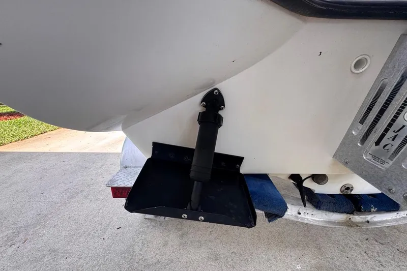 Slide: The Image of 2005 Storm Boats Storm-High Performance boat detail, featuring trim tab and hydraulic system. - 35