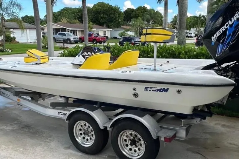 Slide: The Image of 2005 Storm Boats Storm-High Performance on trailer, palm trees in background. - 4