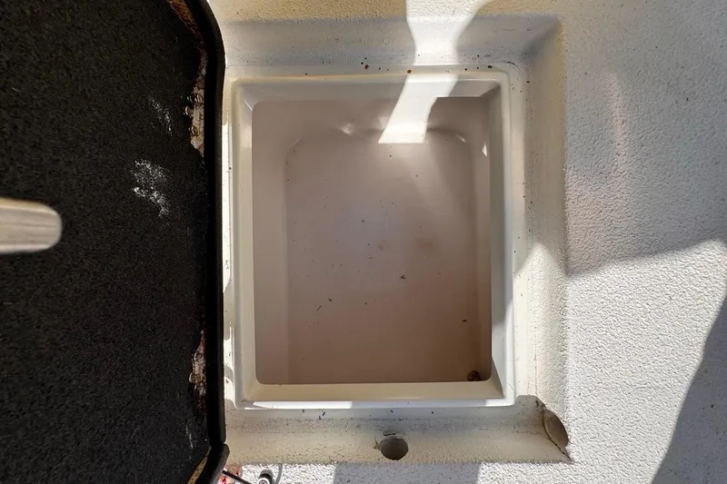 Slide: The Image of Open storage compartment on a 2005 Storm Boats Storm-High Performance vessel. - 47