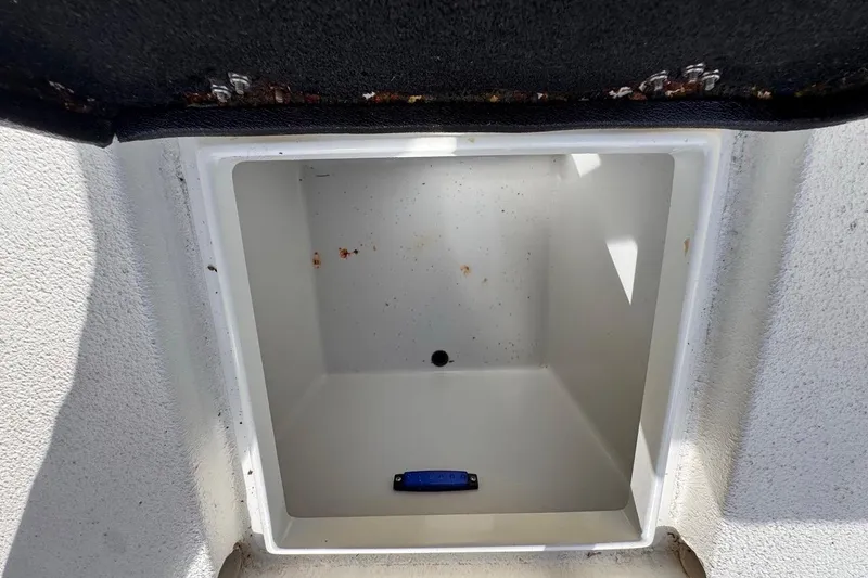 Slide: The Image of Open storage compartment on 2005 Storm Boats Storm-High Performance model. - 48