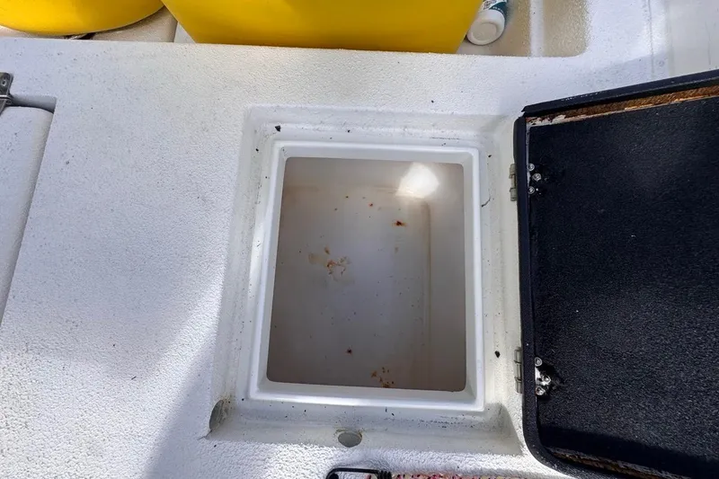 Slide: The Image of Open storage compartment on 2005 Storm Boats Storm-High Performance vessel. - 50