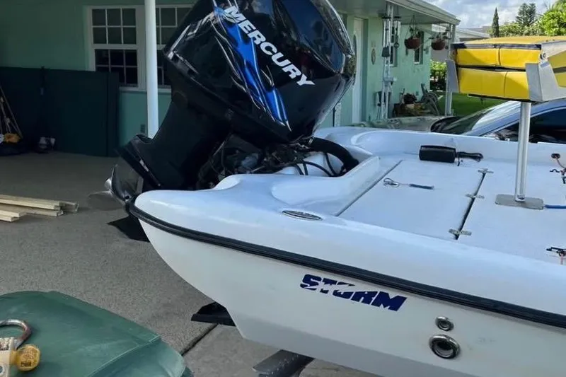 Slide: The Image of Rear view of 2005 Storm Boats Storm-High Performance with propeller, parked on driveway. - 8