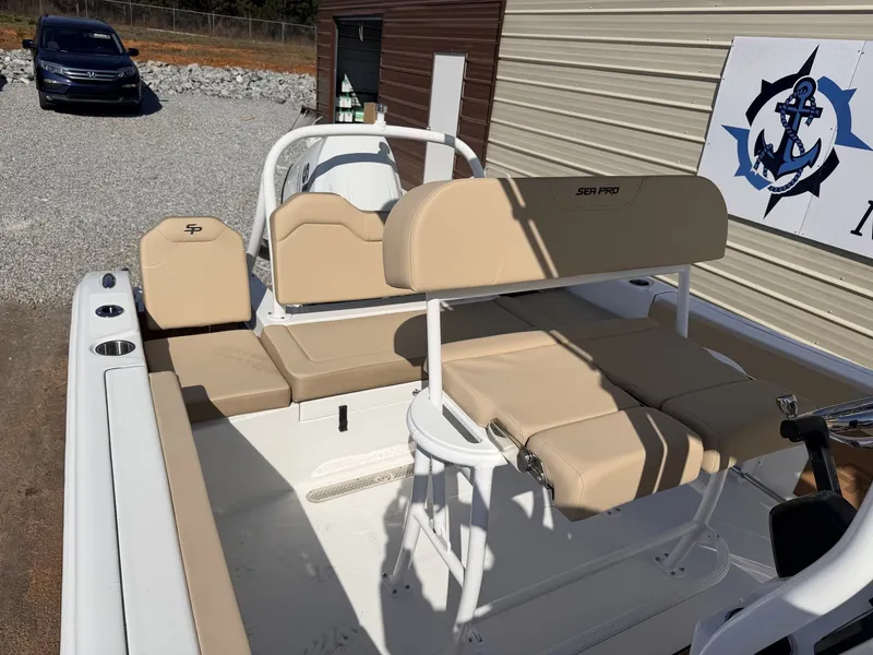 Slide: The Image of 2026 Sea Pro 225FLX Sandbar boat with beige seating. - 15