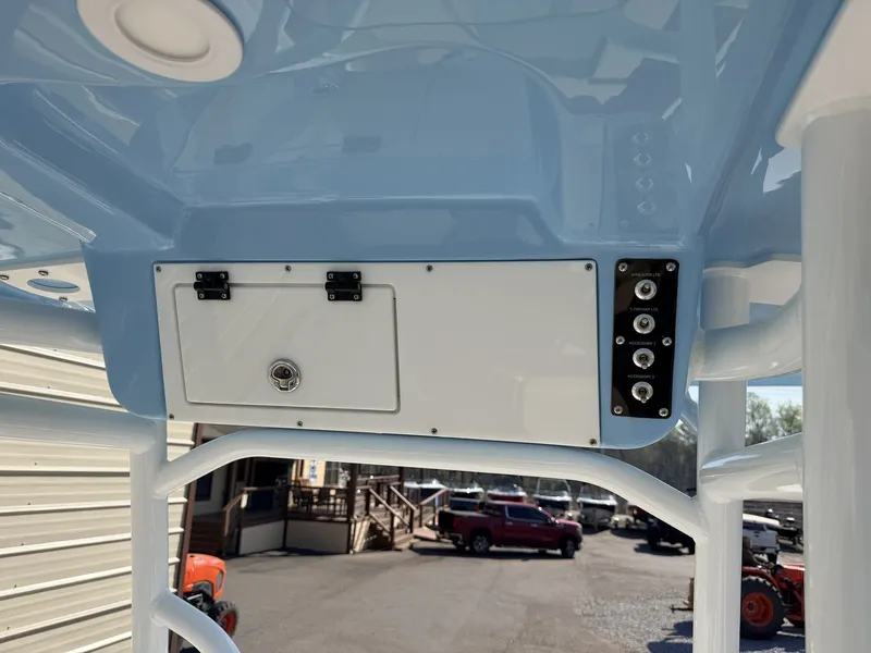 Slide: The Image of Interior view of 2026 Sea Pro 225FLX Sandbar with control console. - 8