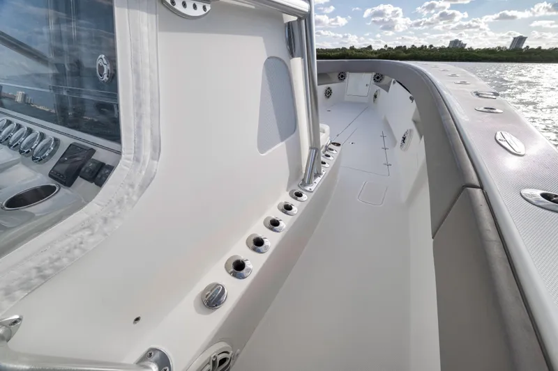 Slide: The Image of 2021 SeaVee 390Z boat deck with sleek design and modern controls. - 17