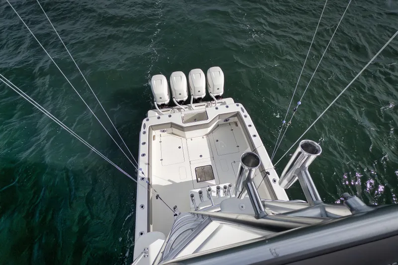 Slide: The Image of Aerial view of 2021 SeaVee 390Z boat with four engines on open water. - 22