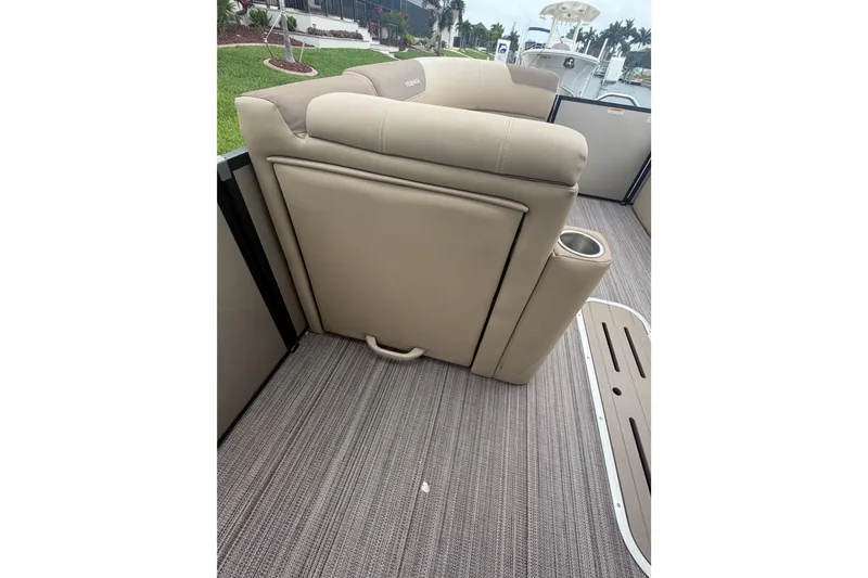 Slide: The Image of Beige seating on 2020 Veranda Relax VR 22 RC boat with cup holder and textured flooring. - 15