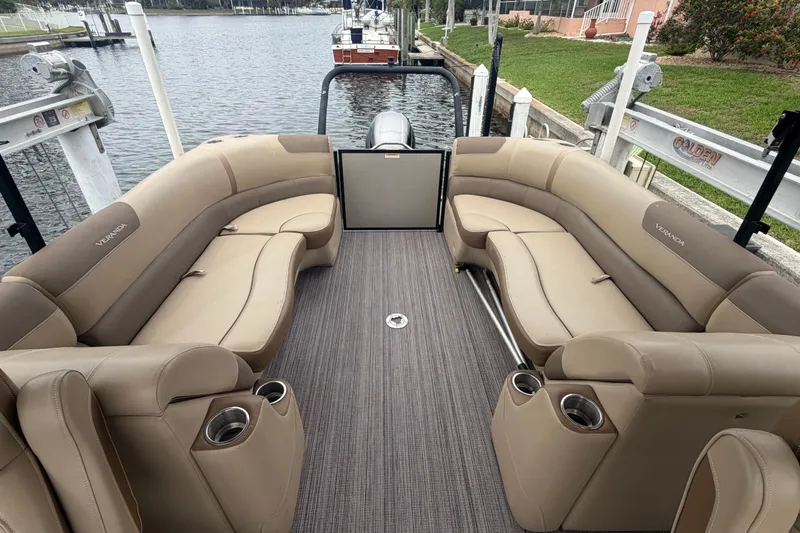 Slide: The Image of 2020 Veranda Relax VR 22 RC pontoon boat with spacious seating and cup holders. - 7