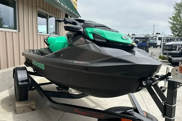 Slide: The Image of 2026 Sea-Doo PWC GTR 230 on trailer, green and black, side view. - 19