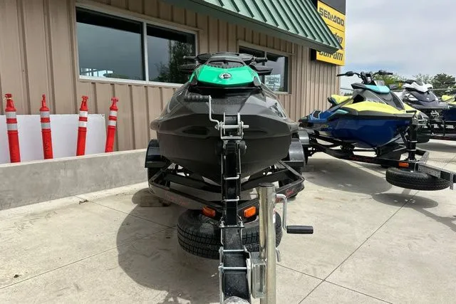 Slide: The Image of 2026 Sea-Doo PWC GTR 230 on trailer outside store. - 20