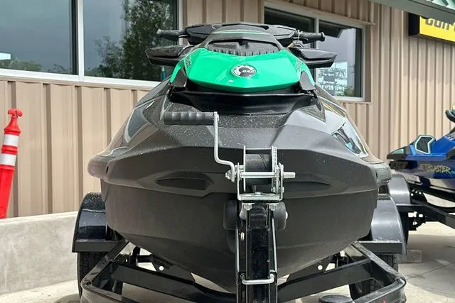 Slide: The Image of 2026 Sea-Doo PWC GTR 230 on trailer, green and black, front view. - 23
