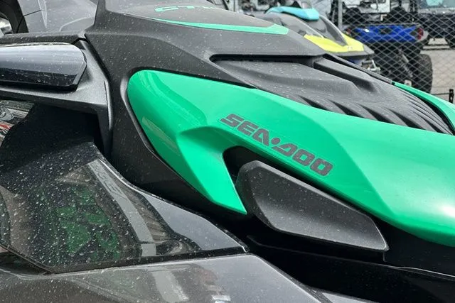 Slide: The Image of Close-up of Sea-Doo PWC GTR 230, 2026 model, in black and green. - 7