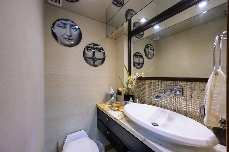 Slide: The Image of Luxurious bathroom on 2013 Hatteras 80 Motor Yacht with modern decor and elegant fixtures. - 10