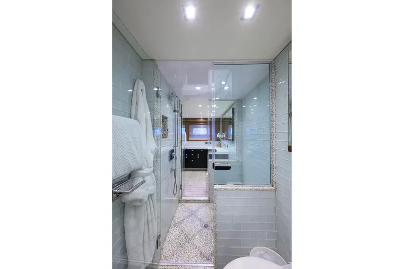 Slide: The Image of Luxurious bathroom interior of 2013 Hatteras 80 Motor Yacht with modern fixtures. - 24