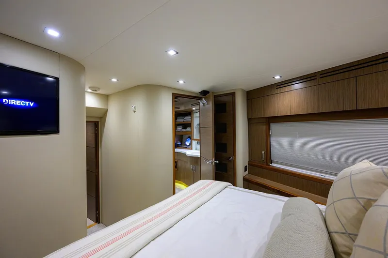 Slide: The Image of Luxurious bedroom interior of 2013 Hatteras 80 Motor Yacht with modern amenities. - 27