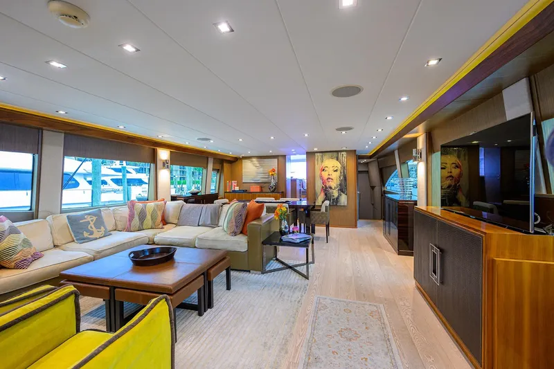 Slide: The Image of Luxurious interior of 2013 Hatteras 80 Motor Yacht with modern decor and spacious seating. - 3