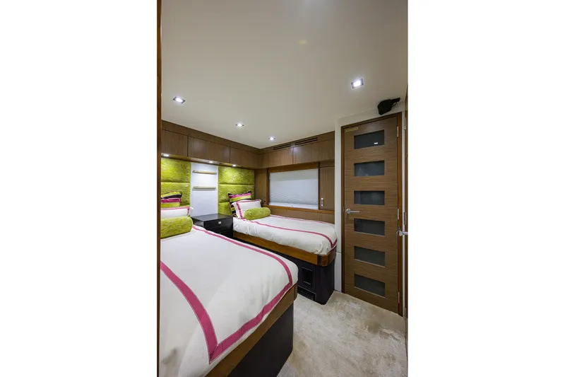 Slide: The Image of Luxurious twin bedroom on 2013 Hatteras 80 Motor Yacht with modern decor. - 30