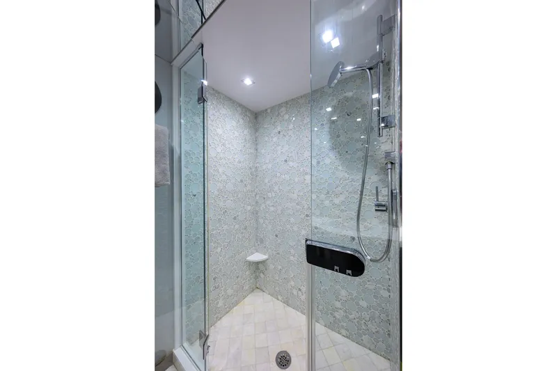 Slide: The Image of Luxurious shower in 2013 Hatteras 80 Motor Yacht with elegant tile design. - 35