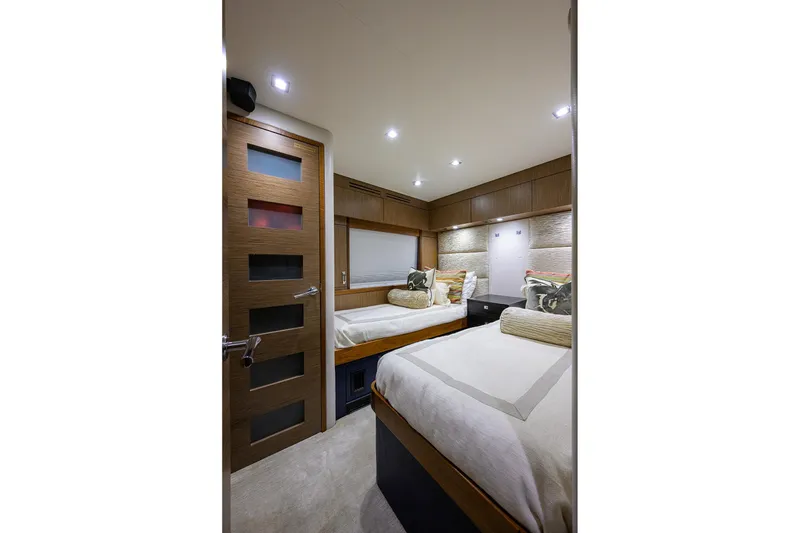 Slide: The Image of Luxurious cabin interior of 2013 Hatteras 80 Motor Yacht with twin beds and modern decor. - 36