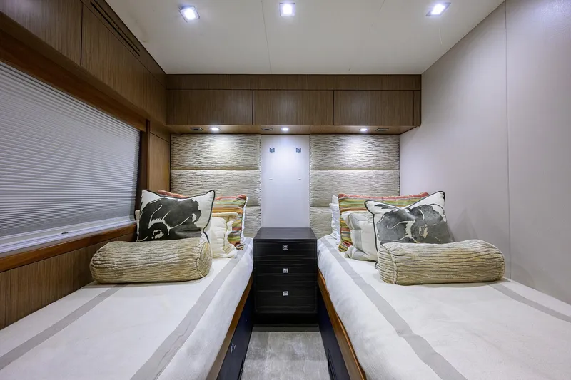 Slide: The Image of Luxurious twin cabin interior of 2013 Hatteras 80 Motor Yacht with elegant decor. - 38