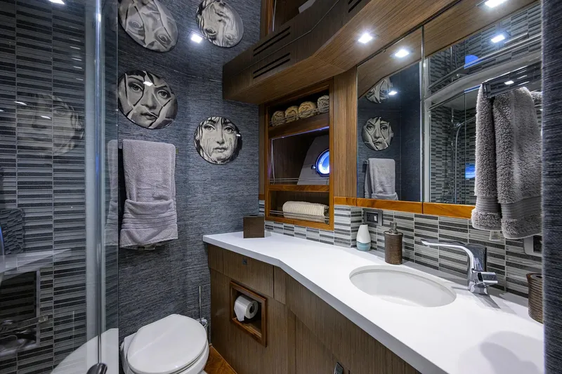 Slide: The Image of Luxurious bathroom in 2013 Hatteras 80 Motor Yacht with modern decor and artistic wall plates. - 42