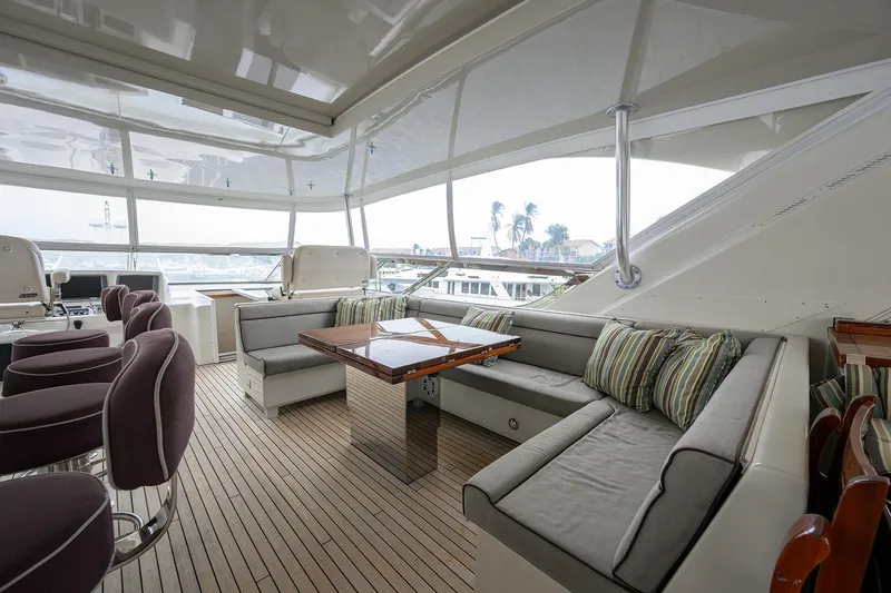 Slide: The Image of Luxurious interior of 2013 Hatteras 80 Motor Yacht with plush seating and elegant design. - 47