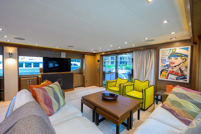 Slide: The Image of Luxurious interior of 2013 Hatteras 80 Motor Yacht with vibrant decor and modern furnishings. - 5