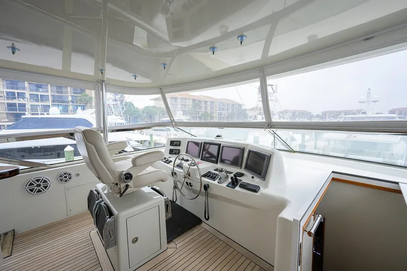 Slide: The Image of Helm station of 2013 Hatteras 80 Motor Yacht with modern navigation equipment. - 50