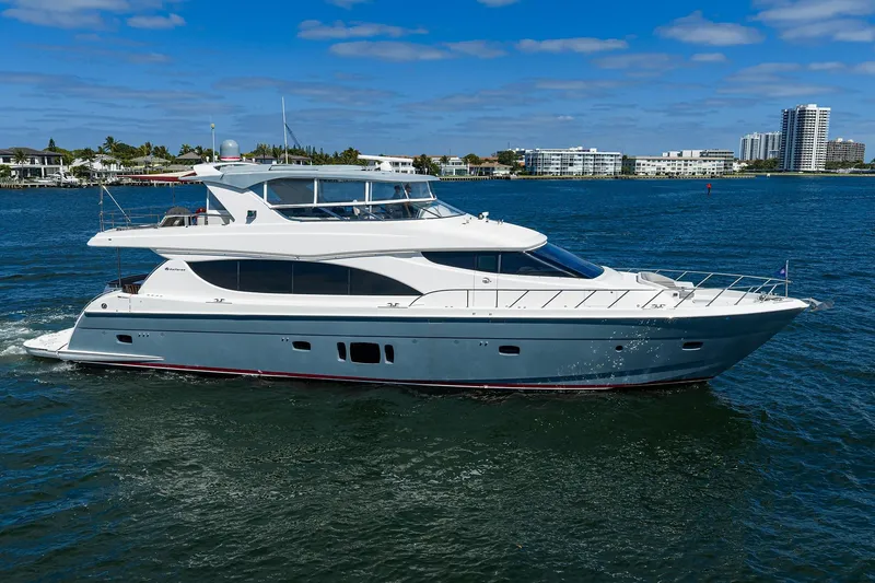 Slide: The Image of Luxury 2013 Hatteras 80 Motor Yacht cruising on a sunny day. - 56