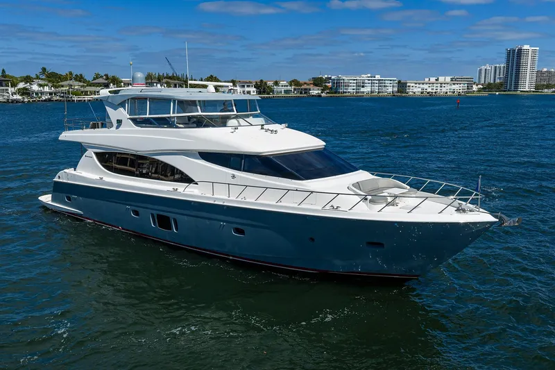 Slide: The Image of 2013 Hatteras 80 Motor Yacht cruising on a sunny day. - 58