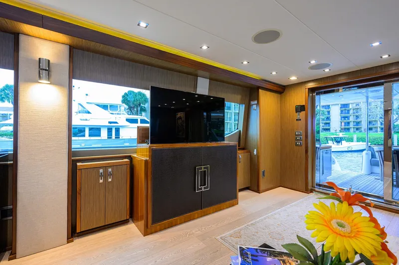 Slide: The Image of Luxurious interior of 2013 Hatteras 80 Motor Yacht with modern decor and entertainment system. - 6
